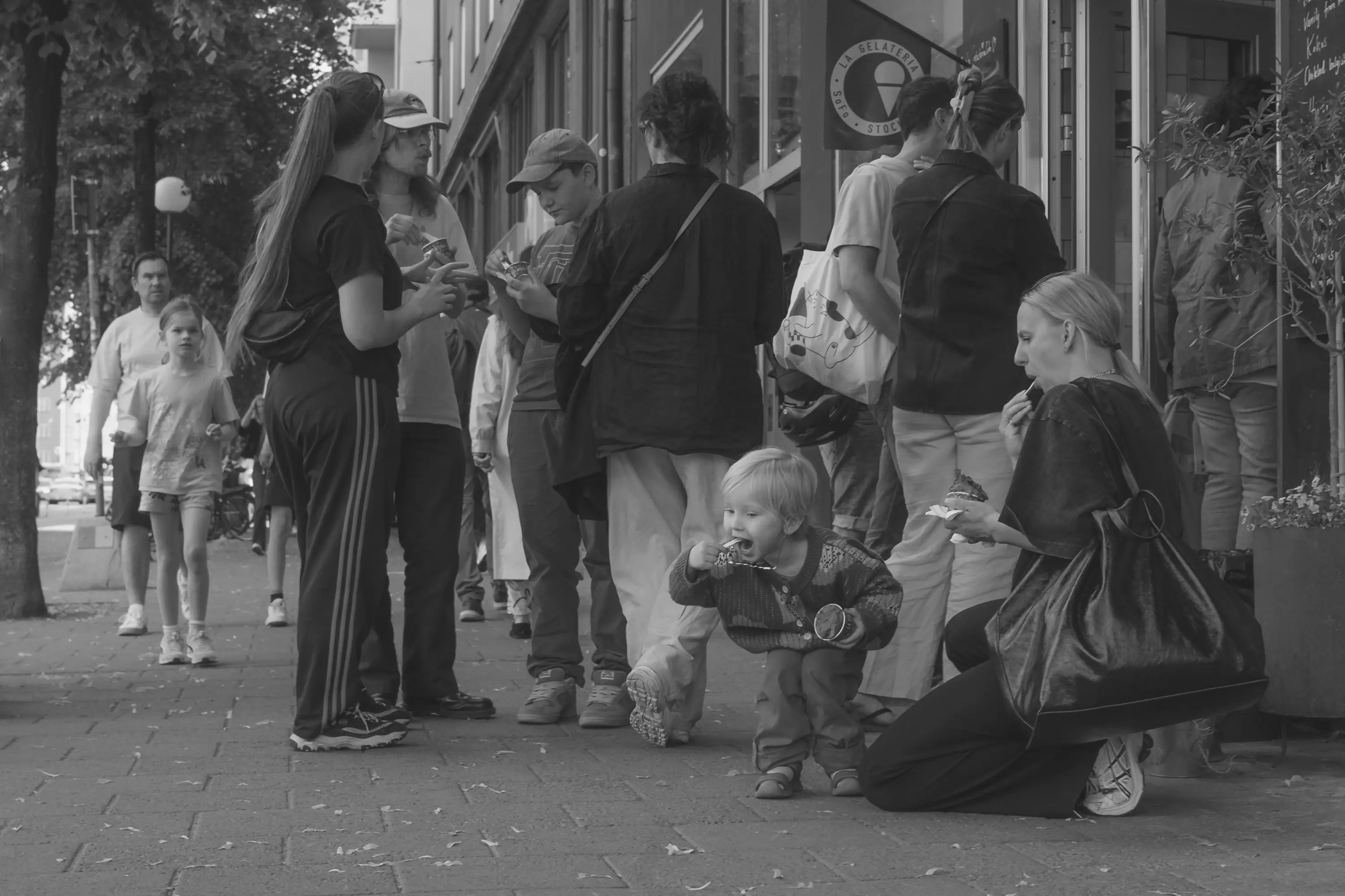 Mother and son eating icecream in Södermalm